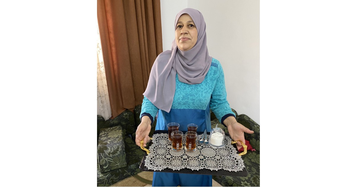 Falsoum Al-Sayyah at Her Galsoum's Kitchen Offering Tea