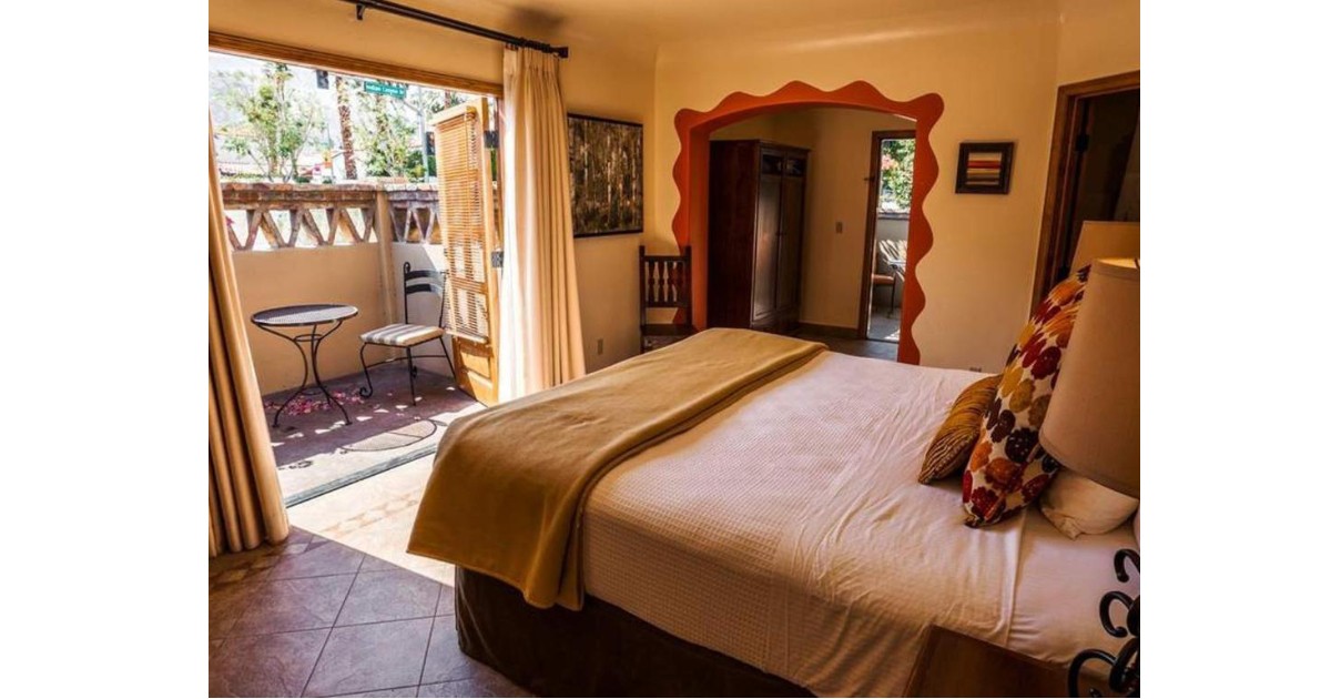 Guest Room with a Private Patio at Los Arboles Hotel