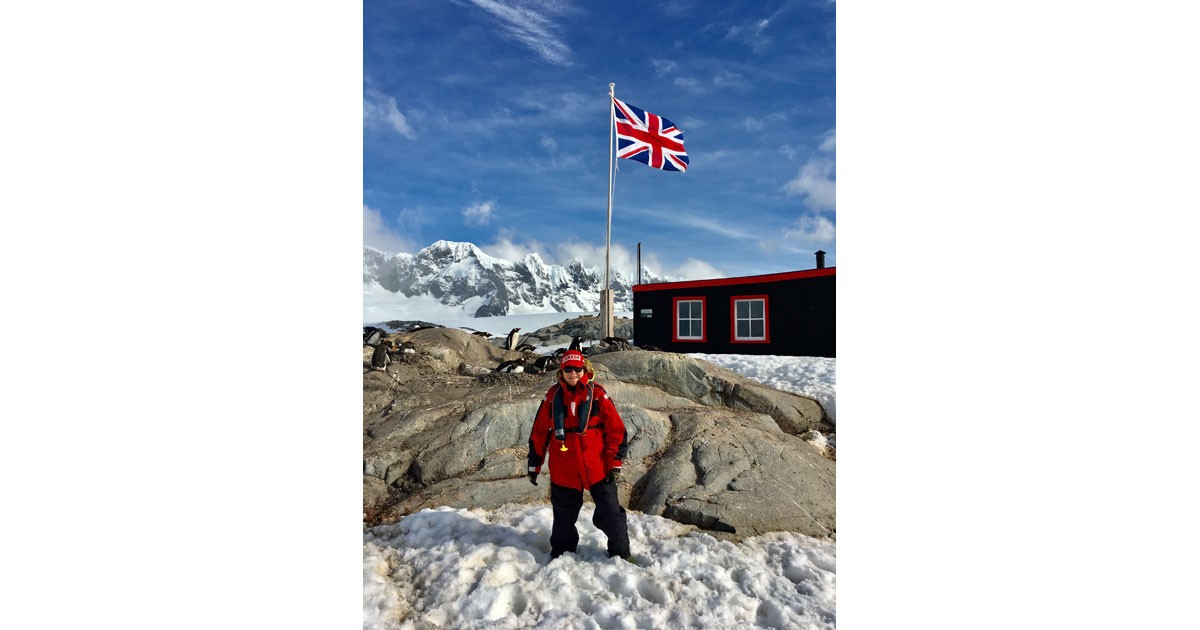 Judi standing in front of the Penguin Post Office at Port Lockroy - February 2017