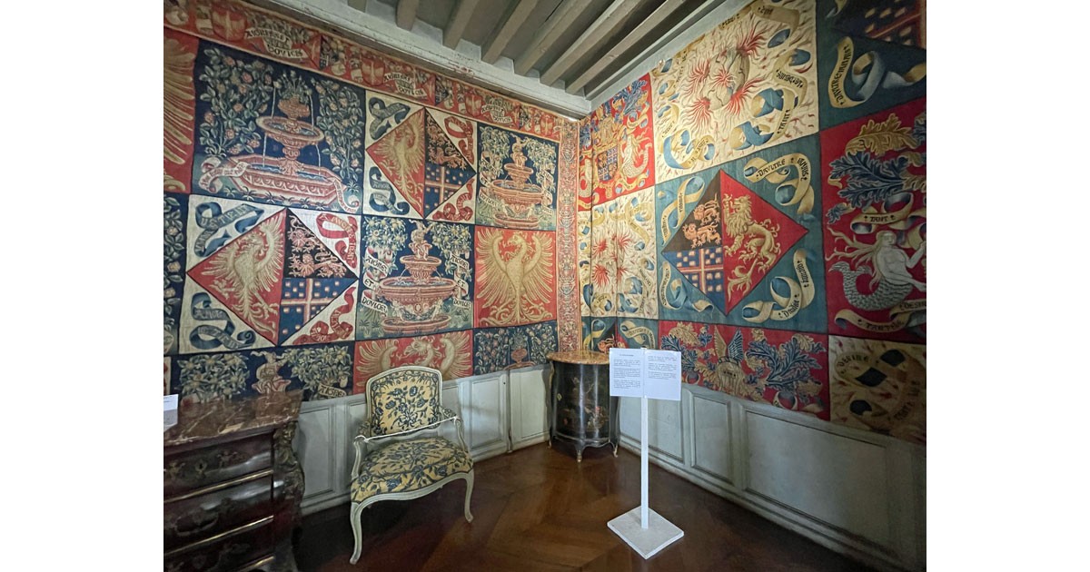 Tapestries line the walls at Chateau Commarin